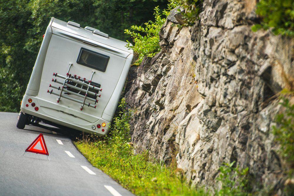 RV with side collision damage